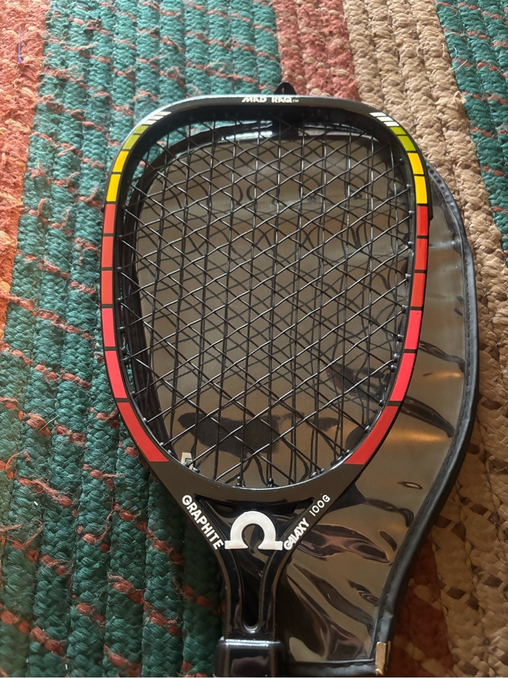 Omega Black Racketball Racket with Red and Yellow Accents - Picture 5 of 6